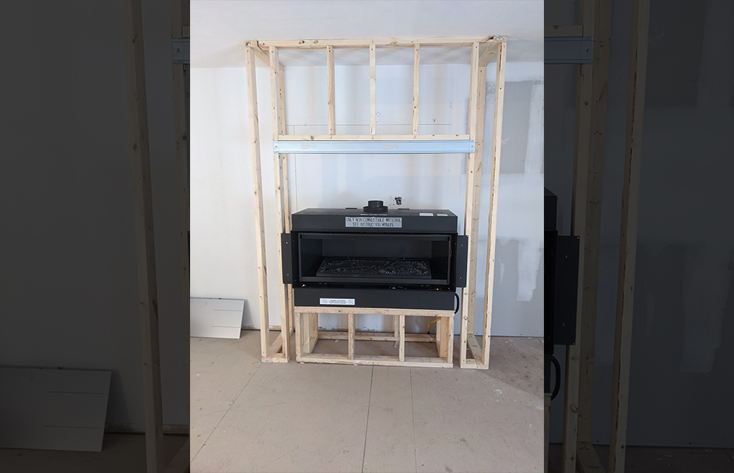 Gas fireplace insert framed and ready for finishing during installation