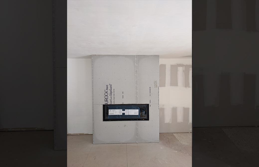 Linear gas fireplace prepped on Durock cement board ready for stone finish
