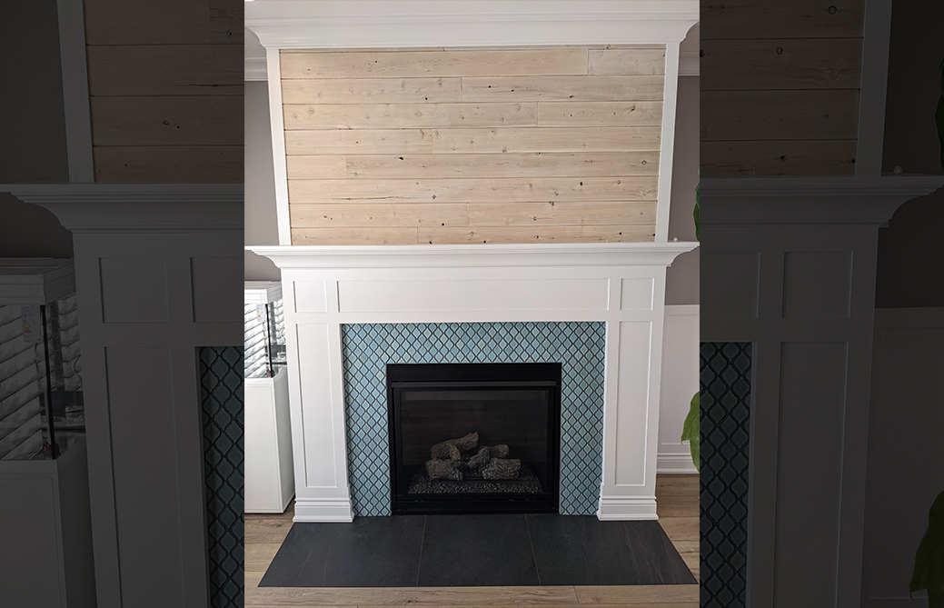Traditional white mantel gas fireplace with blue arabesque tile surround